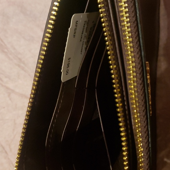 Burgundy coach wristlet